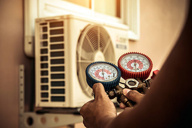 Professional Air Conditioning Service technician working in Worthington, KY